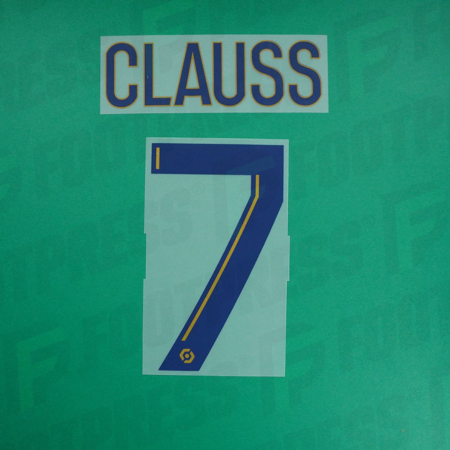 Flocado Oficial - Olympique de Marseille, Clauss, 2022/2023, Local, Azul Oscuro / Dorado (OM)